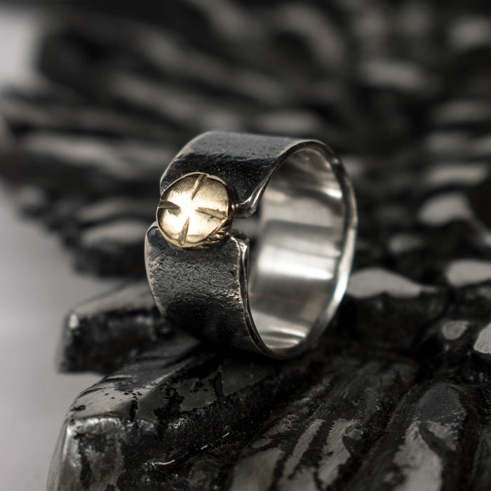 Black and gold button ring