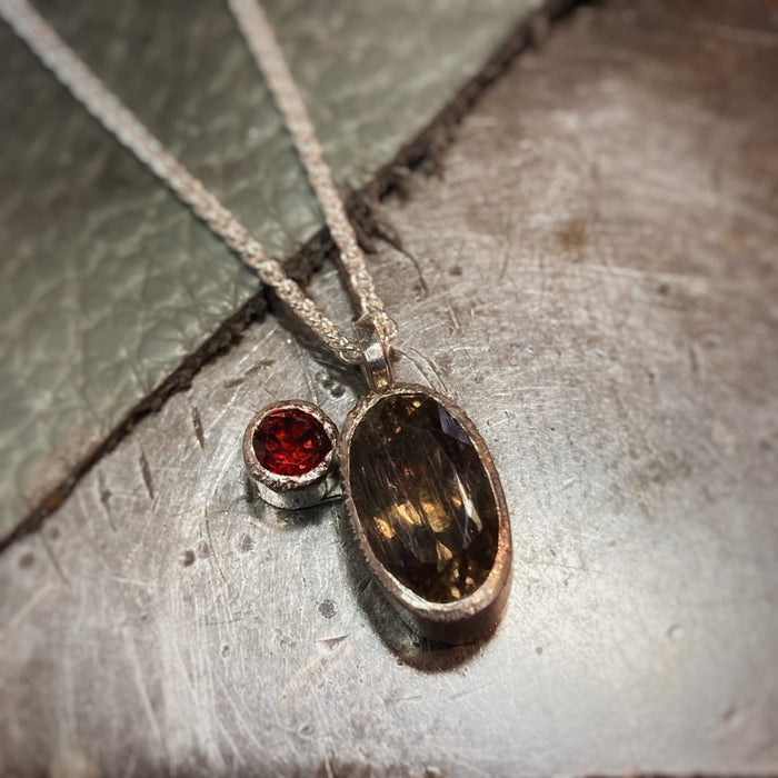 Kunzite and garnet pendant