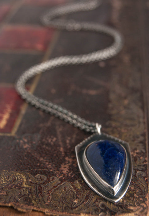 Shield pendant with sodalite