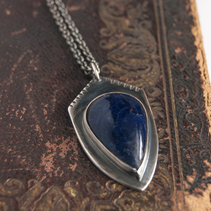 Shield pendant with sodalite