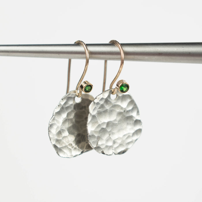 Tsavorite and gold hammered coin earrings
