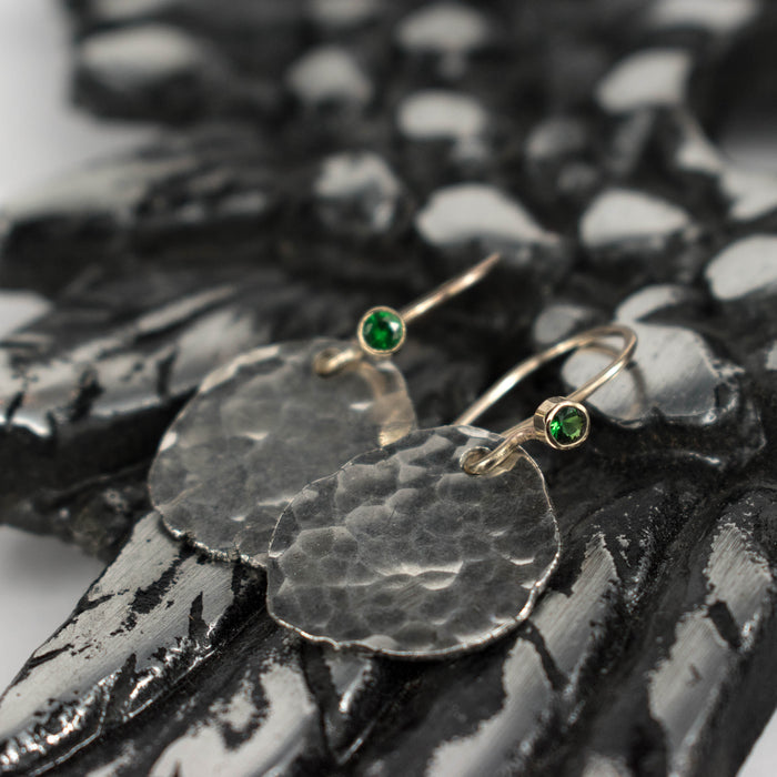 Tsavorite and gold hammered coin earrings