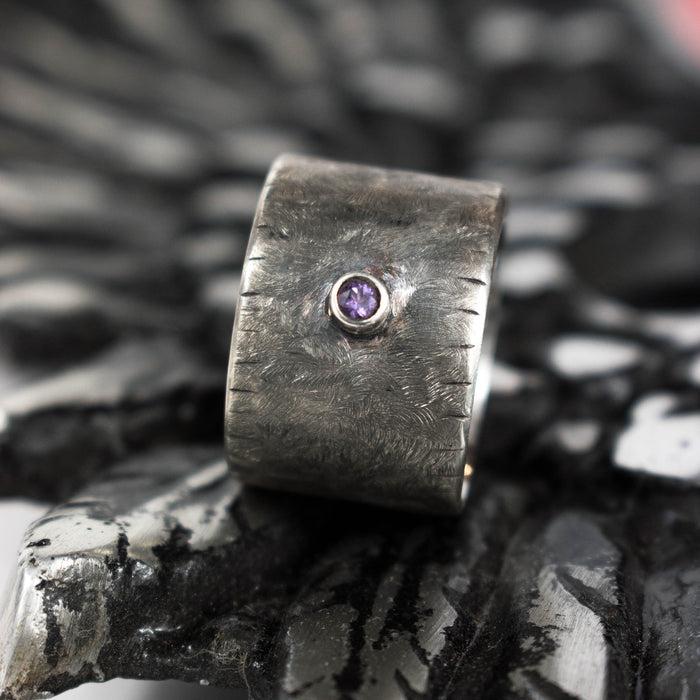 Wide silver ring with amethyst