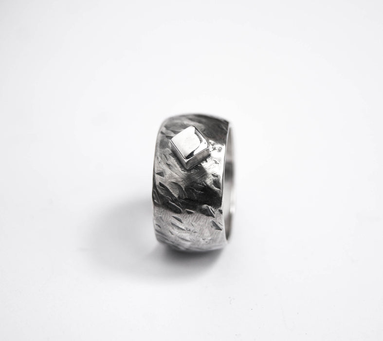 Domed silver ring with square nugget