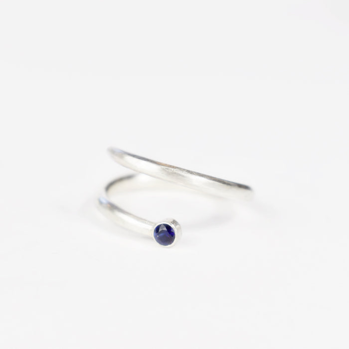 Synthetic sapphire wrap around ring