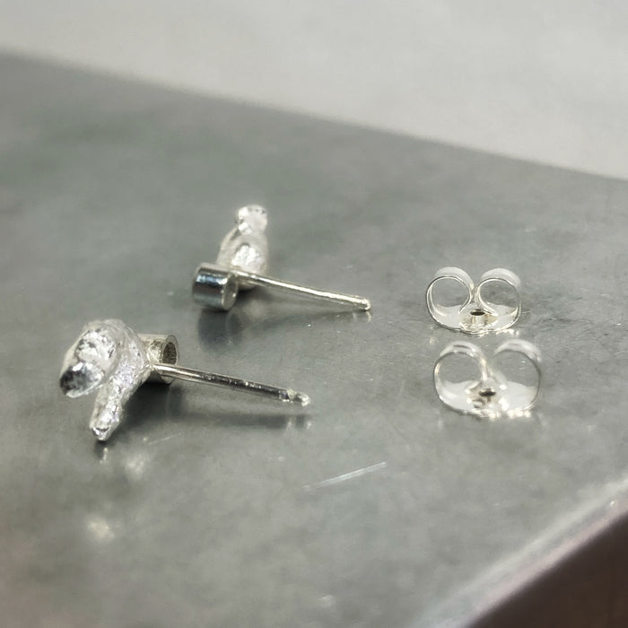 Sapphire and silver ear studs