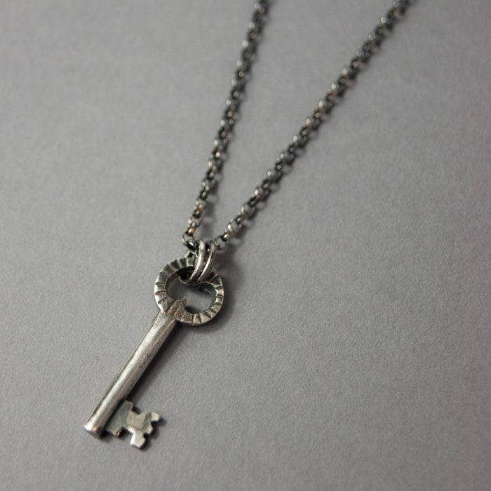 Oxidised silver key pendant